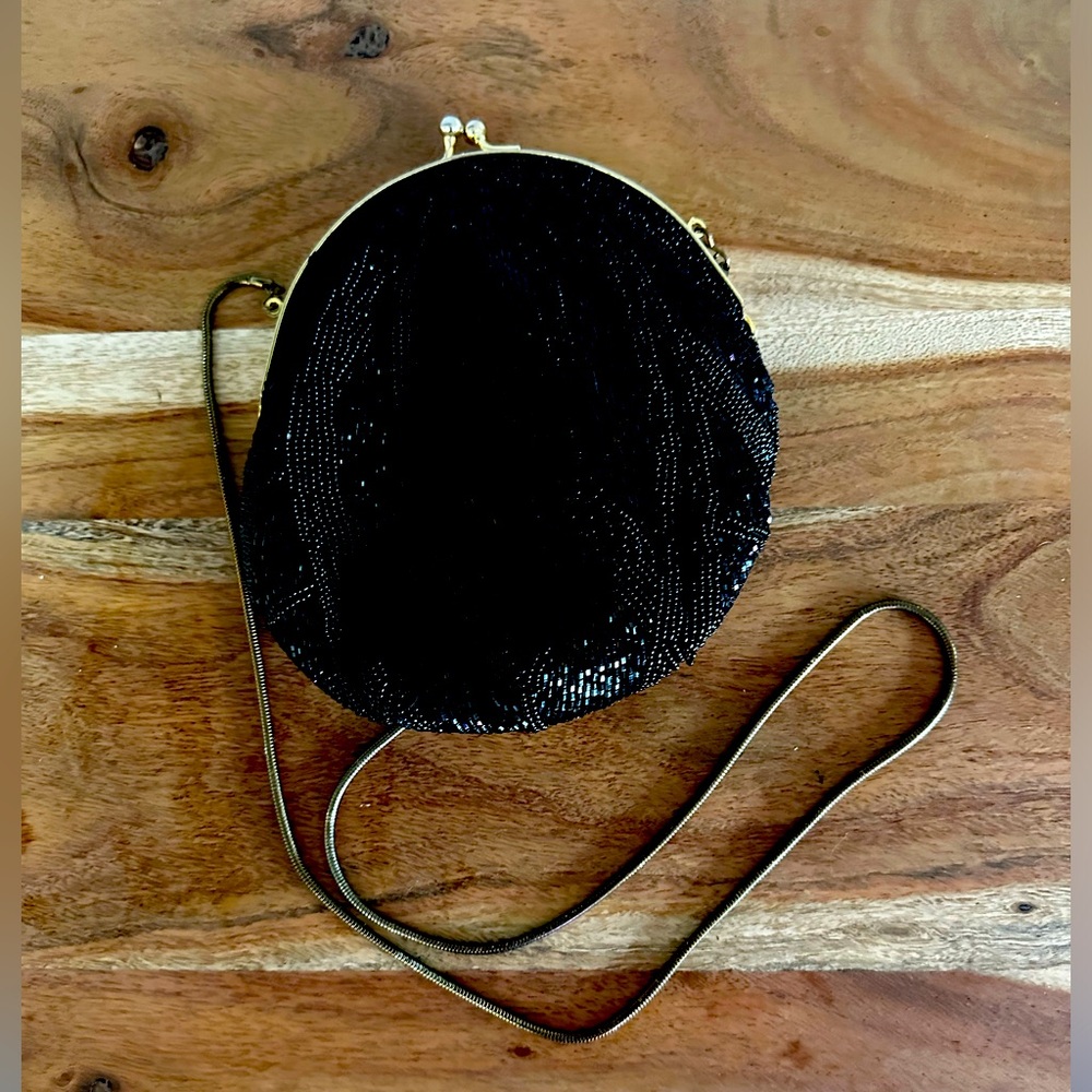 Hand beaded black purse with gold clasp and strap